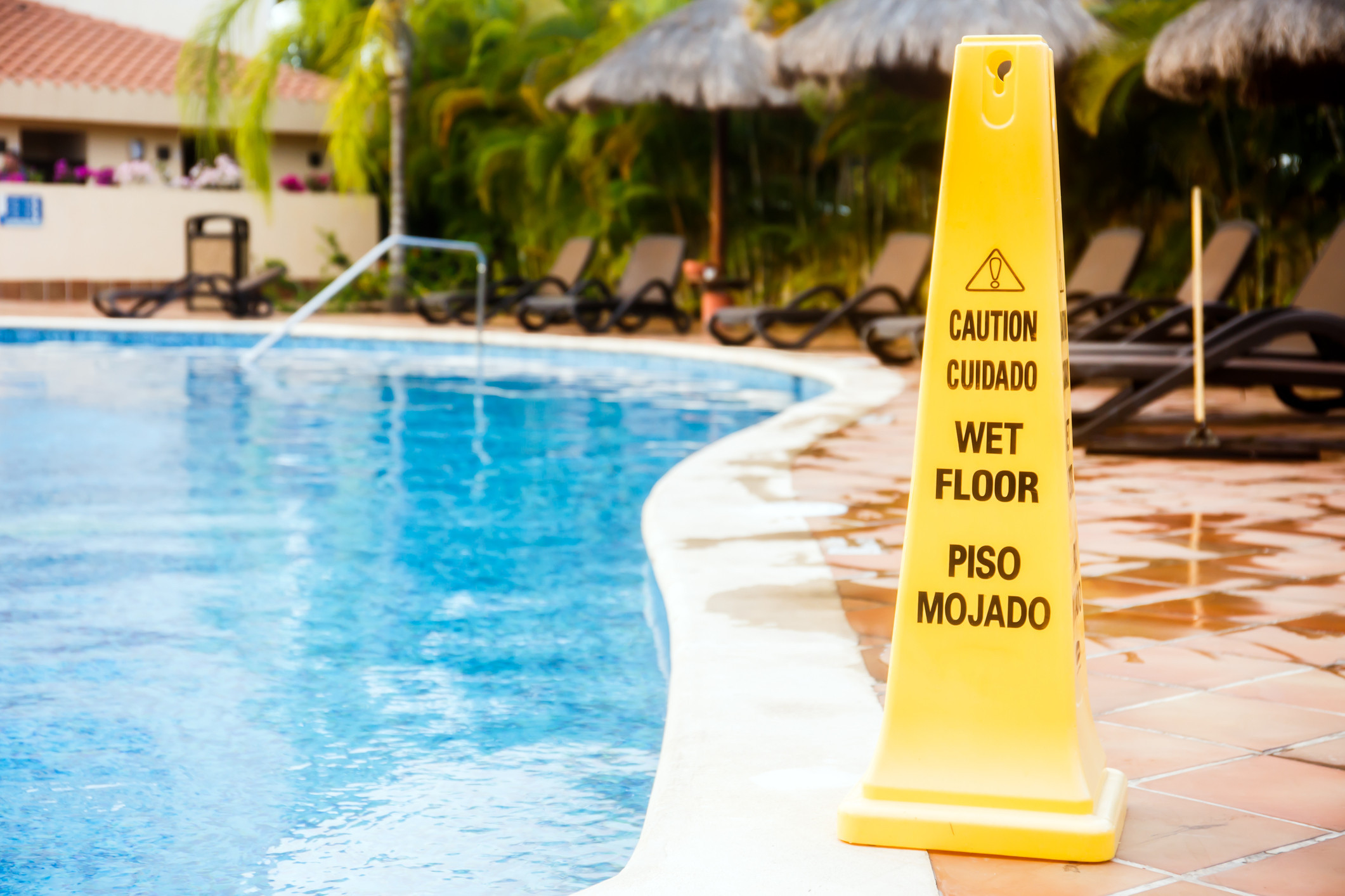 caution cone next to pool